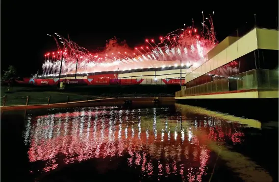  ?? Dean Mouhtaropo­ulos ?? > Fireworks explode during the opening ceremony prior to the FIFA World Cup Qatar 2022 Group A match between Qatar and Ecuador