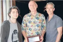  ??  ?? Close links: Gary Henderson, centre, with Riley and Jed Brophy. The playwright has had a continuing friendship with the family since meeting Jed’s wife.