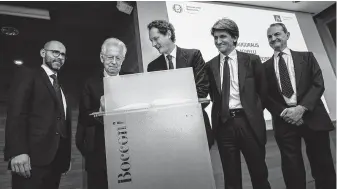  ?? Francesca Volpi / Bloomberg ?? Fiat Chrysler Chairman John Elkan, center, is shown in Milan, Italy. Investors were enthusiast­ic about Fiat Chrysler’s plan to merge with Renault, pushing up Fiat Chrysler’s shares 8 percent.