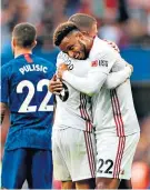  ??  ?? All smiles: Oliver Norwood celebrates United’s equaliser with Lys Mousset