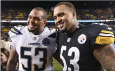  ?? AP PHOTO/DON WRIGHT ?? In this December 2018, file photo, Pittsburgh Steelers center Maurkice Pouncey, right, and his brother, Los Angeles Chargers center Mike Pouncey pose after playing against each other in an NFL football game in Pittsburgh. The twin brothers announced their retirement from profession­al football on Friday.