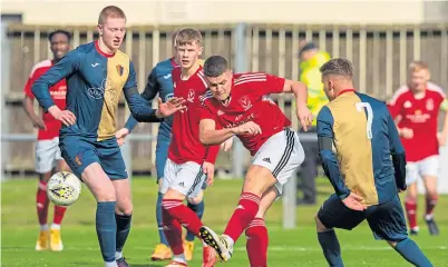  ?? ?? Deveronval­e’s Innes Mckay shoots at goal against East Kilbride