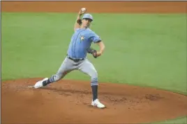  ?? The Associated Press ?? BOUNCED BACK: Tampa Bay Rays’ Tyler Glasnow throws during practice Tuesday in St. Petersburg, Fla.