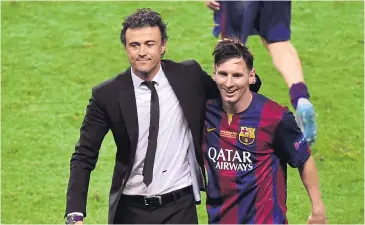  ?? AFP ?? Luis Enrique and Barcelona forward Lionel Messi, right, celebrate after winning the Uefa Champions League against Juventus.