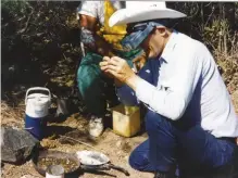  ??  ?? In Chihuahua, Benny examines the gem moonstone Editor Bob and son Evan mined with him.