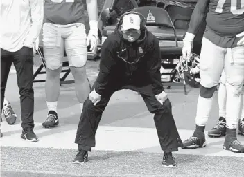  ?? KEITH BIRMINGHAM AP ?? USC head coach Clay Helton watches during the second half of Saturday's game against Arizona State.