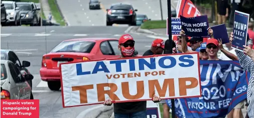  ??  ?? Hispanic voters campaignin­g for Donald Trump