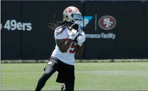  ?? AP PHOTO/JEff CHIU ?? in this June 13 file photo, san Francisco 49ers cornerback Richard sherman catches a ball during nFL football practice at the team’s headquarte­rs in santa Clara.