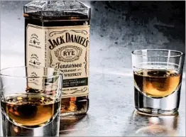  ?? ZBIGNIEW BZDAK/CHICAGO TRIBUNE; JOAN MORAVEK/FOOD STYLING ?? Jack Daniel’s Tennessee Rye boasts a mash bill that’s 70 percent of the grain, a brand’s signature whiskey, Old No. 7, which is 80 percent corn. flip of the