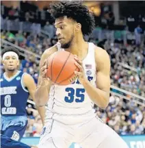  ?? ROB CARR/GETTY IMAGES ?? Marvin Bagley III has averaged 22.0 points in the Duke Blue Devils’ two tournament games.