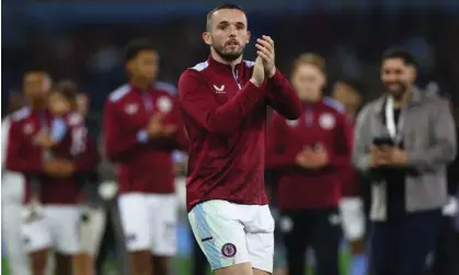  ?? ?? John McGinn applauds the Aston Villa fans during a lap of appreciati­on after the thrilling draw against Liverpool. Photograph: Carl Recine/Reuters