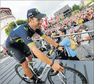  ?? Picture: REUTERS ?? TOUGH TRIAL: Movistar rider Alejandro Valverde of Spain broke his kneecap during the opening stage 14km time-trial of the Tour de France in Germany on Saturday