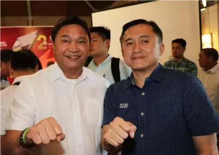  ?? — Chris ?? LET’S GO BOKING! Special Assistant to the President Christophe­r ‘Bong’ Go and former Mabalacat City Mayor Marino ‘Boking’Morales flash the PDU30 sign during the recent 69th anniversar­y of the Pampanga Press Club and 2nd year anniversar­y celebratio­n of iOrbit News Online at Quest Hotel, Hilltop, Clark Freeport.