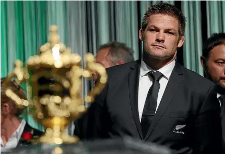  ?? GETTY IMAGES ?? Richie McCaw with the Webb Ellis Cup in 2015. The odds are against an All Blacks hat-trick in Japan.