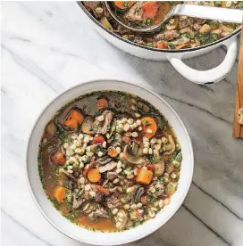  ?? [PHOTO BY CARL TREMBLAY, AMERICA’S TEST KITCHEN/AP] ?? This beef barley soup with mushrooms and thyme appears in the cookbook “All-Time Best Soups.”