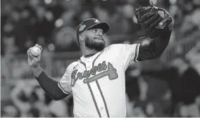  ?? Kevin C. Cox / Tribune News Service ?? Braves closer Kenley Jansen could possibly face his former club, the Dodgers, this week after an offseason that saw him leave the only team he’s ever known.