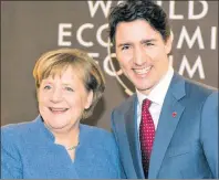  ?? CP PHOTO ?? Prime Minister Justin Trudeau meets with German Chancellor Angela Merkel at the World Economic Forum Wednesday in Davos, Switzerlan­d.