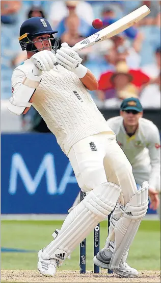  ?? Picture: REUTERS ?? RAMPING IT UP: England batsman Stuart Broad executes an unorthodox shot as Australia's captain Steve Smith watches from the slips cordon on the third day of the fourth Ashes Test at the Melbourne Cricket Ground yesterday. Broad, who scored 56, added...