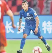  ??  ?? This file picture taken on Sept 16 shows Shanghai Shenhua’s Carlos Tevez fighting for the ball during the Chinese Super League football match between Shanghai East Asia (SIPG) FC and Shanghai Shenhua in Shanghai. — AFP photo