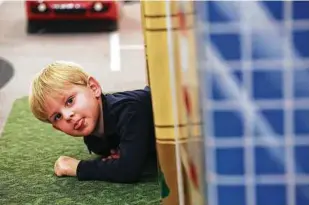  ??  ?? The playground can be a rambunctio­us spot, but kids get the health benefits of play and generally practice taking turns.