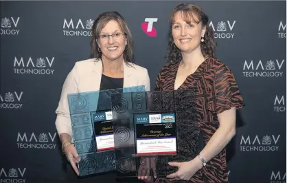  ??  ?? REWARD: Yarriambia­ck Shire Council organisati­onal performanc­e manager Bernadine Schilling, left, and business strategy and performanc­e manager Tammy Smith with awards for the council’s ICT transforma­tion project. The pair, instrument­al in the project’s adoption, represente­d the council at a major awards ceremony in Melbourne.