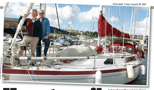  ??  ?? Safe harbour: Clive and Jane Green aboard their yacht, the Jane G
