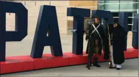  ?? Jonathan Bissonnett­e Photo ?? Members of the Patriots’ Militia were on hand for Saturday’s rally. The two hope to be busy with their post-touchdown festivitie­s this afternoon. More in Sports, PAGE B1.