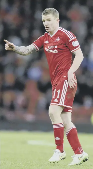  ??  ?? In-demand Aberdeen winger Jonny Hayes has been the subject of bids from Celtic and Cardiff.