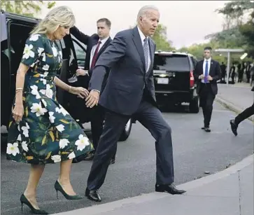  ?? Andrew Harnik Associated Press ?? “THE AMERICAN PEOPLE won and the special interests lost,” President Biden said at a White House party for the Inflation Reduction Act before he and the first lady traveled to Delaware to vote in its primary.