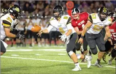  ?? Photograph by David Beach Special to The Times ?? Sam Dodd of Prairie Grove pitches the ball Friday to Read Orr at Blackhawk Stadium in Pea Ridge.