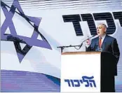  ?? JACK GUEZ/GETTY-AFP ?? Israeli Prime Minister Benjamin Netanyahu spoke to a gathering of Likud Party members and accused the media and the opposition of pushing the corruption probe.