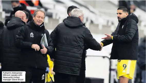  ??  ?? Fulham’s Aleksandar Mitrovic speaks with Newcastle United manager Steve Bruce