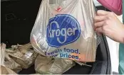  ?? ROGELIO V. SOLIS / AP ?? The Federal Trade Commission on Feb. 16 sued to block a proposed merger between grocery giants Kroger and Albertsons, saying the $24.6 billion deal would eliminate competitio­n and lead to higher prices.