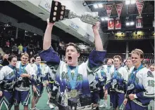  ?? CLIFFORD SKARSTEDT/EXAMINER ?? Peterborou­gh Mincom Kawartha Lakes Realty Jr. C Lakers celebrate their Meredith Cup win Tuesday night.