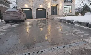  ??  ?? A heated driveway saves Cordahi from having to shovel even in our long, cold winters. The heated grate at the end of the driveway prevents the run-off from pooling and freezing on the road in Mount Royal.