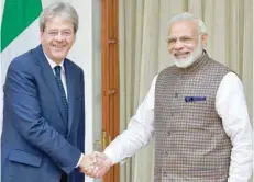  ?? — Reuters ?? Prime Minister Narendra Modi with his Italian counterpar­t Paolo Gentiloni before their meeting at Hyderabad House in New Delhi on Monday.