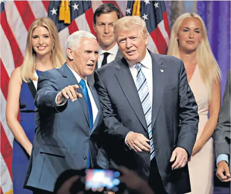  ??  ?? Donald Trump with vice-presidenti­al choice Mike Pence, the governor of Indiana, in New York