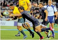  ?? Reuters ?? Argentina’s Moroni tackle’s Australia’s Will Genia. —