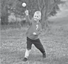  ?? PHOTOS PROVIDED BY MARIA CLARK DEFORREST ?? Zeke Clark practices pitching in his Phillies sweatshirt.