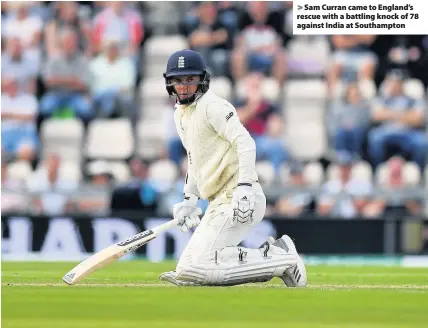  ??  ?? &gt; Sam Curran came to England’s rescue with a battling knock of 78 against India at Southampto­n