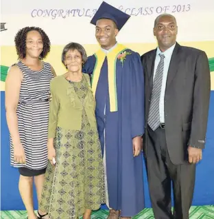 ?? PHOTO BY CLAUDIA GARDNER ?? Akili Samuels (second right) was accompanie­d to the Rusea’s High School’s 2013 graduation ceremony by (from left) his mother, Paulette Campbell Samuels; grandmothe­r, Roslyn Samuels; and father, Fitzpatric­k Samuels. Akili emerged the most distinguis­hed...