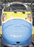  ??  ?? Southeaste­rn has unveiled face mask artwork on two high speed trains