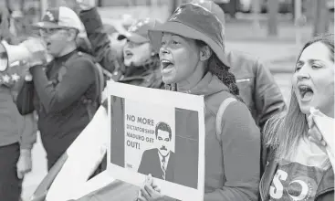  ?? Kos Stiller / Bloomberg ?? A demonstrat­or makes her feelings known about Venezuelan President Nicolas Maduro on Thursday outside the 172nd Organizati­on of the Petroleum Exporting Countries meeting in Vienna, Austria. According to emails and documents, Syria and Venezuela sought...