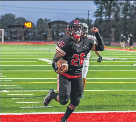  ?? SHANE PABON — FOR THE MORNING JOURNAL ?? Elyria’s Vance Glover celebrates after scoring a touchdown Aug. 28against Elyria Catholic. The Pioneers won, 27-7.