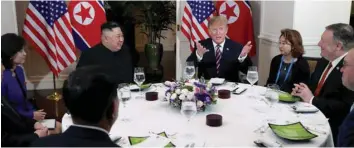  ??  ?? US President Donald Trump and North Korean leader Kim Jong Un sit down for a dinner during the second Us-north Korea summit at the Metropole Hotel in Hanoi, Vietnam on February 27, 2019. Also pictured at right are US Secretary of State Mike Pompeo and Acting White House Chief of Staff Mick Mulvaney. — Reuters file photo