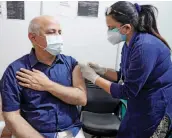  ?? — PTI ?? Delhi Dy CM Manish Sisodia receives his second dose of Covid-19 vaccine in New Delhi on Tuesday.