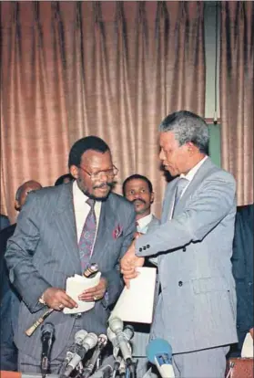  ??  ?? At the ANC’s behest: Inkatha Freedom Party leader Mangosuthu Buthelezi and Nelson Mandela. Photo: Walter Dhladhla/AFP
