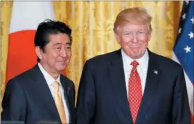  ?? PABLO MARTINEZ MONSIVAIS — THE ASSOCIATED PRESS ?? In this file photo, U.S. President Donald Trump, right, and Japanese Prime Minister Shinzo Abe stand on stage together at the conclusion of their joint news conference in the East Room of the White House in Washington.