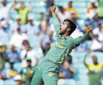  ?? (Photo: AFP) ?? Pakistan’s Mohammad Amir celebrates taking the wicket of India’s Rohit Sharma, lbw for 0, during the ICC Champions Trophy final cricket match at The Oval in London in this June 18, 2017 file photo.