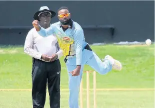  ?? LENNOX ALDRED ?? Man of the Match Left-arm spinner Ryan Francis of the Surrey Royals in action after picking up four for 17 against the Surrey Kings in the Dream11 Jamaica T10 competitio­n at Sabina Park in Kingston on Thursday.